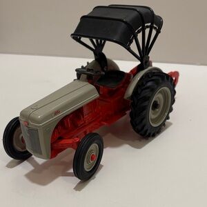 Ertl Ford 8N tractor with plow, 50th anniversary collectors edition.